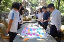 平壌での大学生交流で、意見交換をおこなう日朝の大学生たち