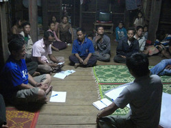 井戸の修理費徴収方法を話し合うミーティング